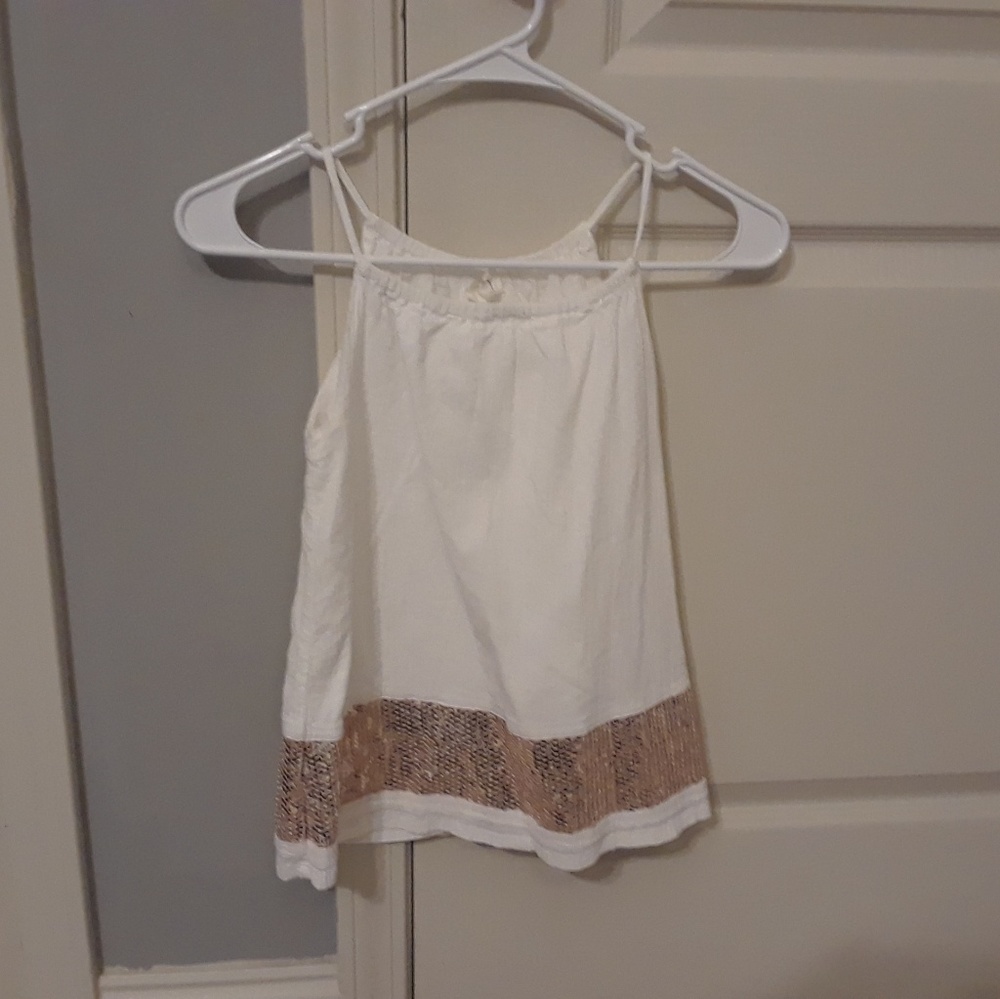 white flowy tank top with gold sparkles